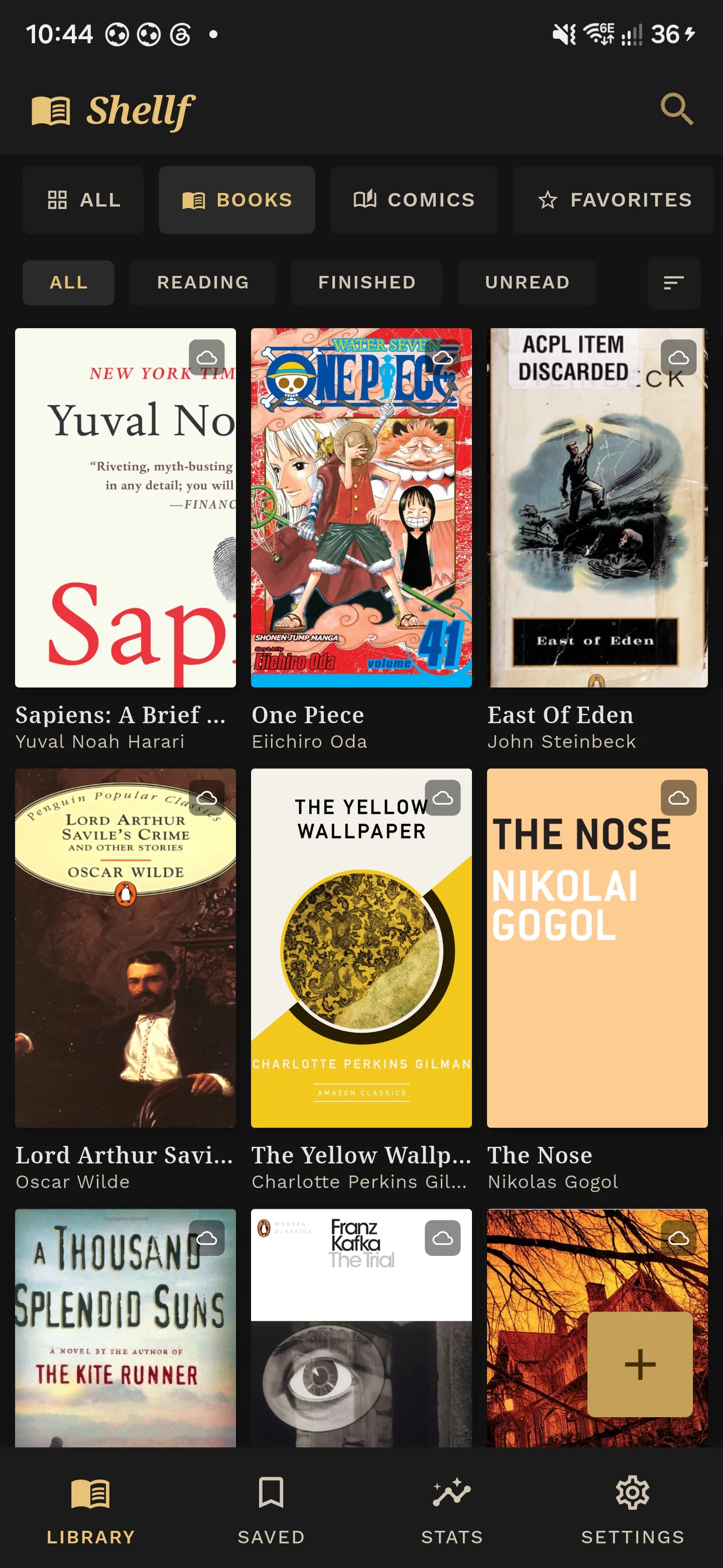 Shellf library view: a three column dark grid of book and manga covers with Books, Comics and Favorites filters